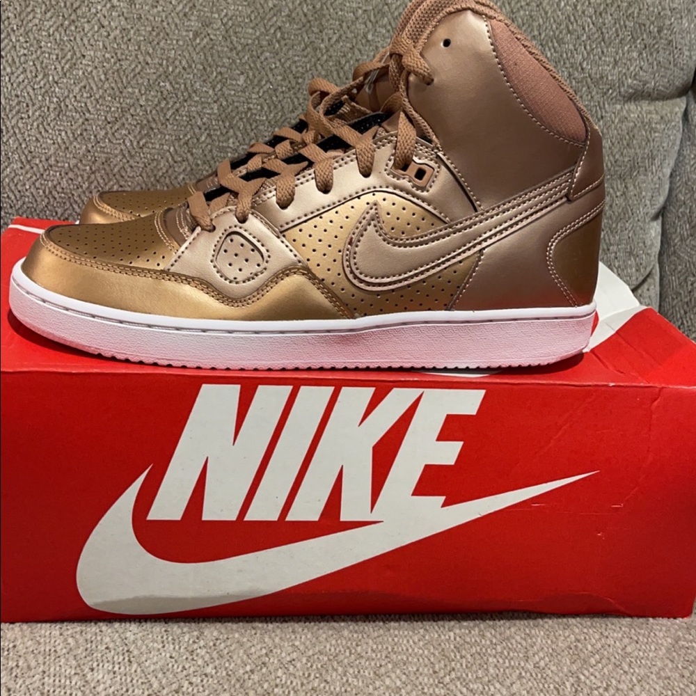 Brand new Nikes, size 9.5 color bronze